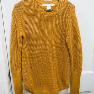 Orange sweater. Buttons down back